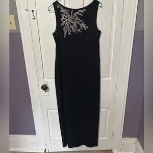 Elegant Black Sleeveless Dress with Silver Embellishments